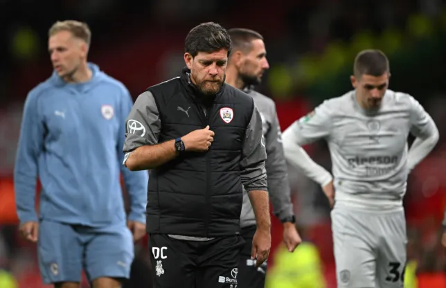 Barnsley boss points finger at players for spoiling his big day out following Manchester United thrashing